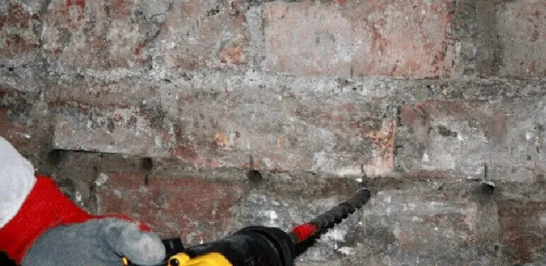 Tanking and damp-proof re-plastering to a ground-floor wall in Easton BS5 Bristol